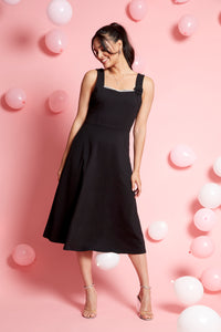 Compli K Noir sleeveless dress with rhinestone trim & flower brooch
